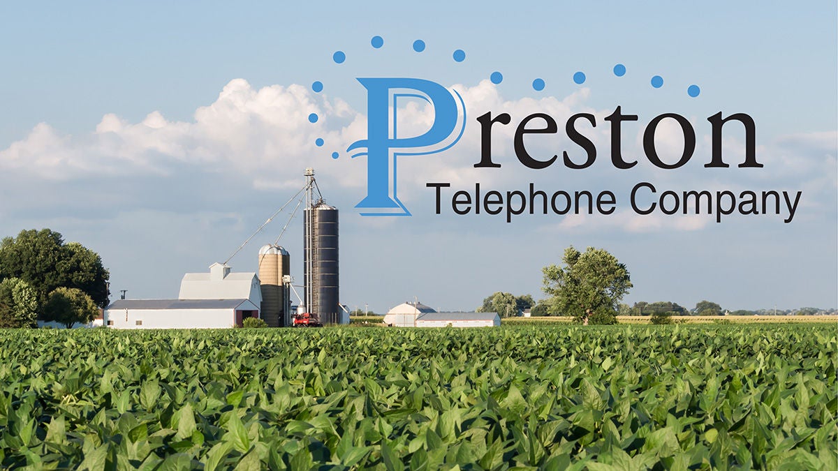 Preston Telephone Company logo over farm